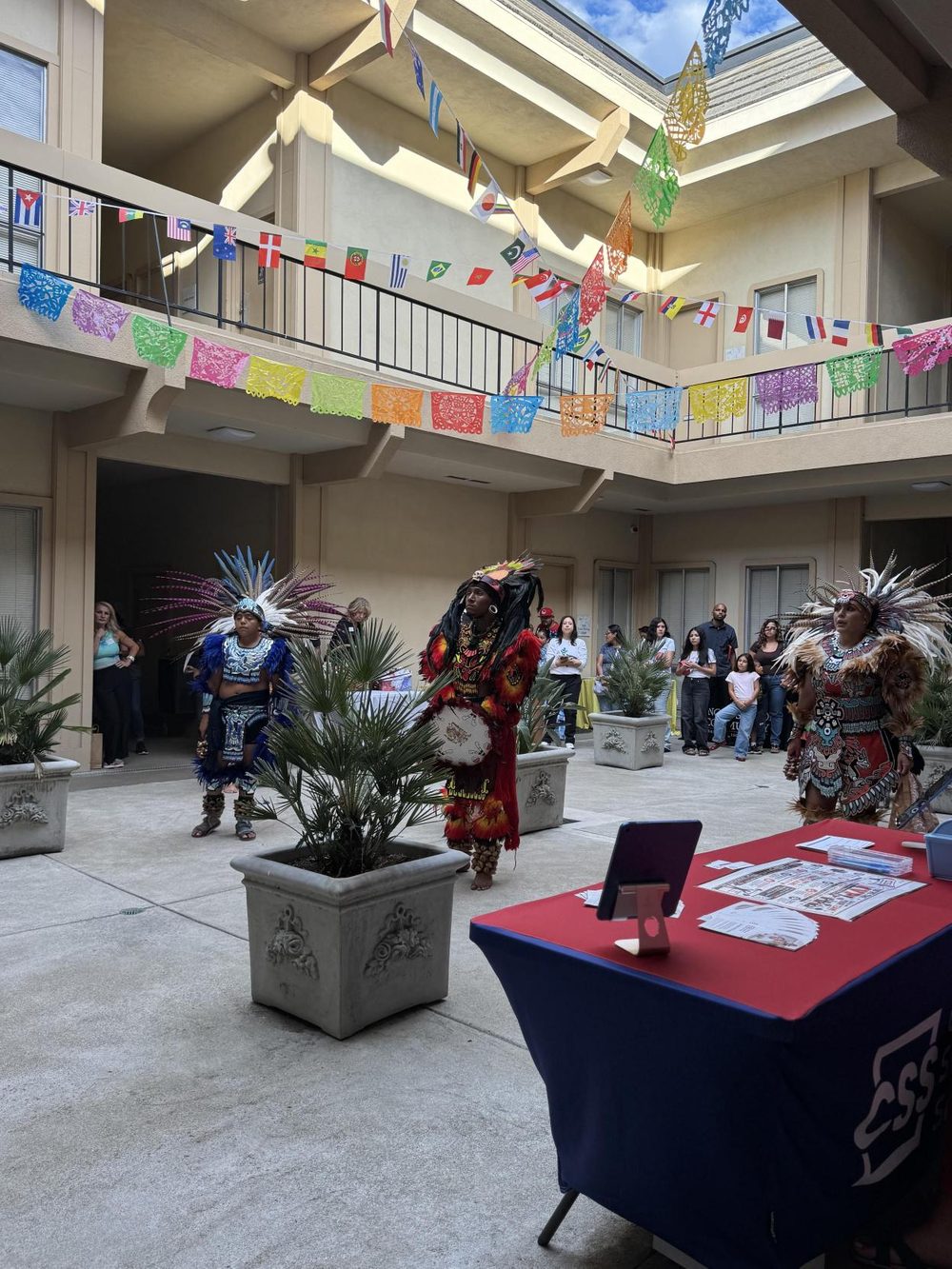 Danza Azteca dancers performing before the community