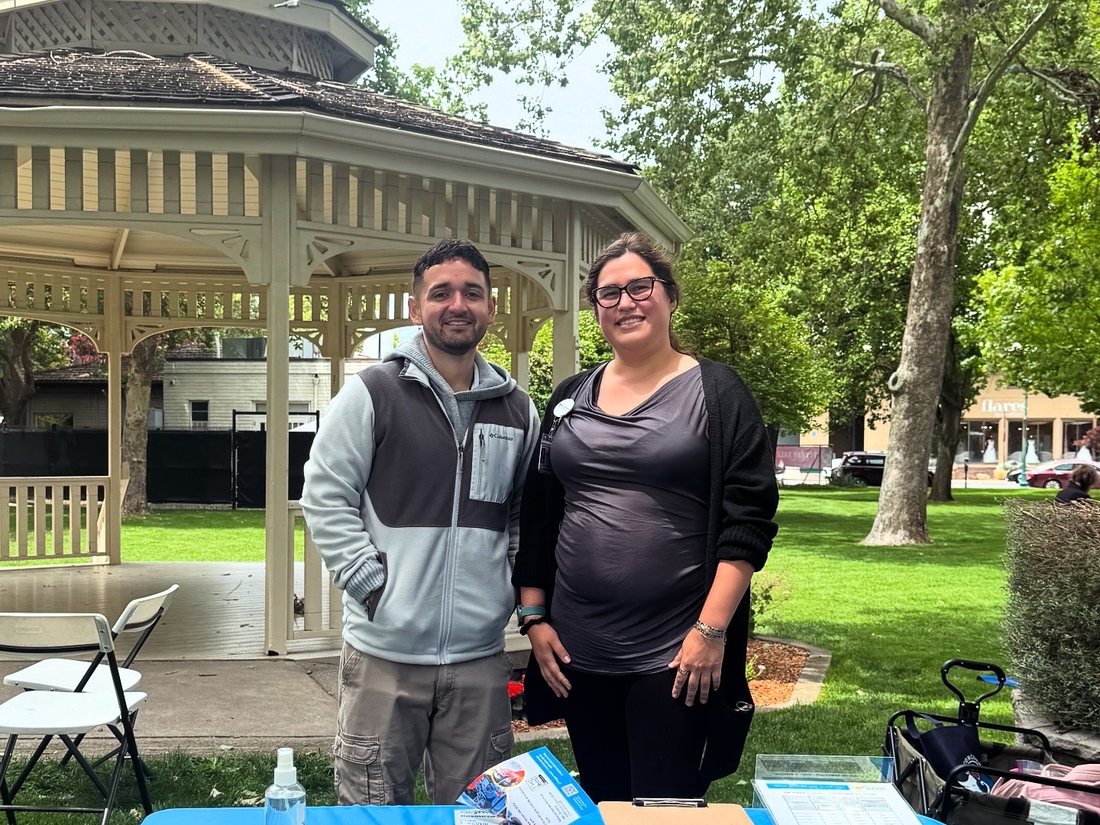 A family at a La Concordia community event